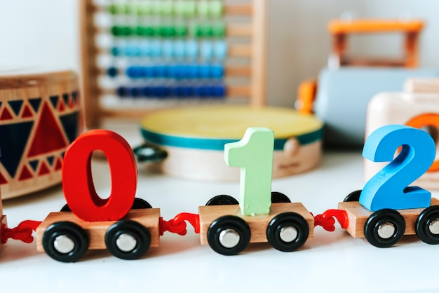 Free photo set of kid toys on a white shelf