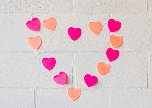 Set of paper hearts on wall