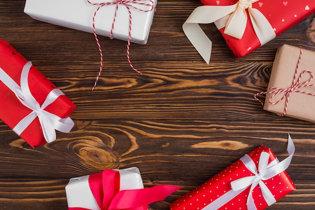 Set of present boxes with ribbons and threads 