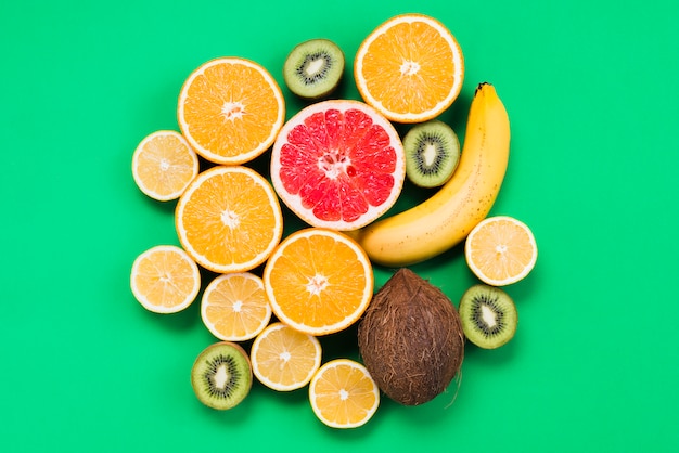 Free photo set of sliced fresh exotic fruits