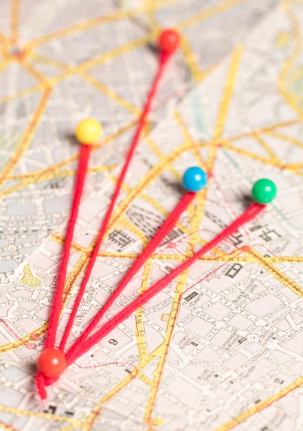 Set of stationery pins and thread and route map