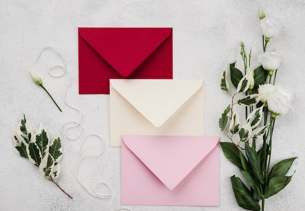 Set of wedding invitation envelopes with flowers