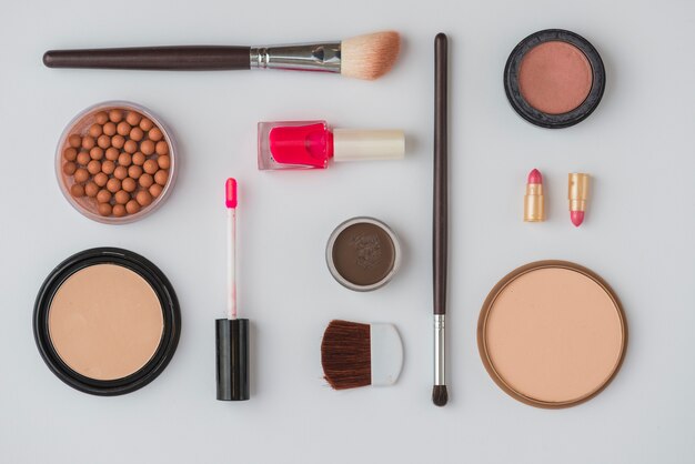 Set of woman's makeup product on white background