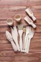 Free photo set of wooden kitchen utensils,top view