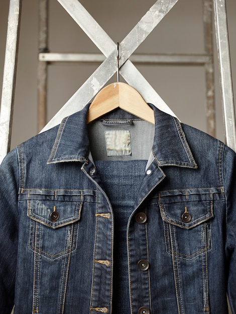 sewing denim jacket and buttons