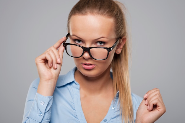 Free Photo sexy blonde businesswoman with glasses