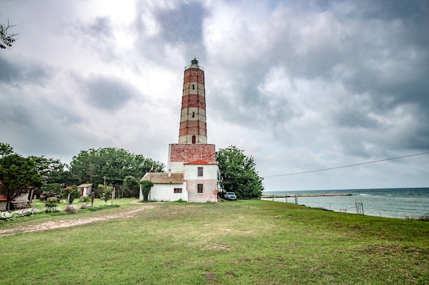 Shabla lightghouse with cloudy sky in the background in Bulgaria