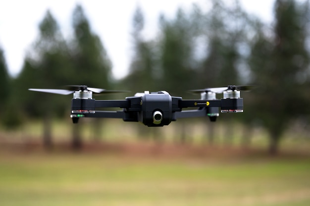 Free photo shallow focus shot of a drone flying at the ranch in california