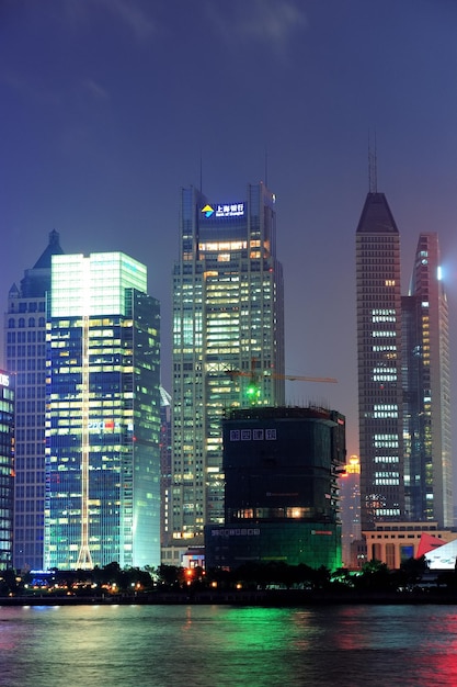 SHANGHAI, CHINA - JUNE 2: Crowded urban skyscrapers at dusk on June 2, 2012 in Shanghai, China. Shanghai is the largest city by population in the world with 23 million as in 2010.