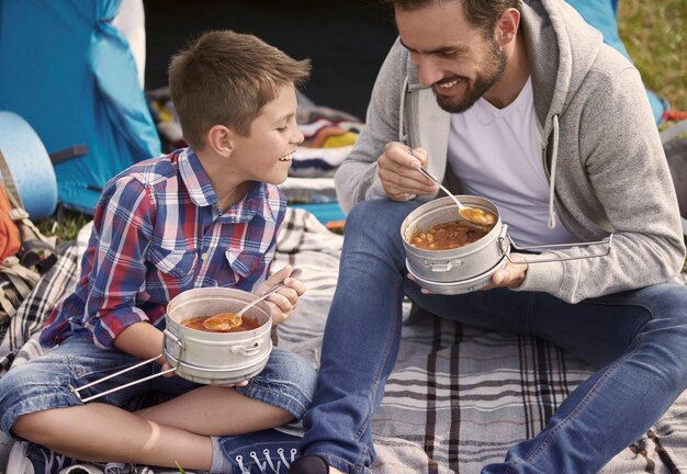 Shared dinner eaten by the father and his son