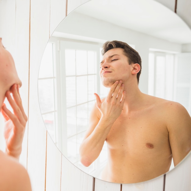 Shaving concept with attractive man