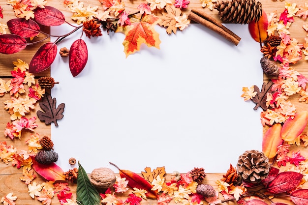 Free photo sheet of paper among leaves