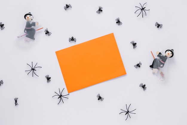 Free Photo sheet of paper with decorative spiders and witches around