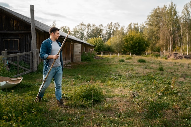 Shepherd walking on field side view