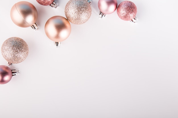 Free photo shining pink baubles on white