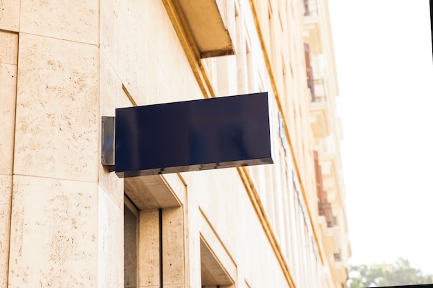 Free photo shiny black sign on wall