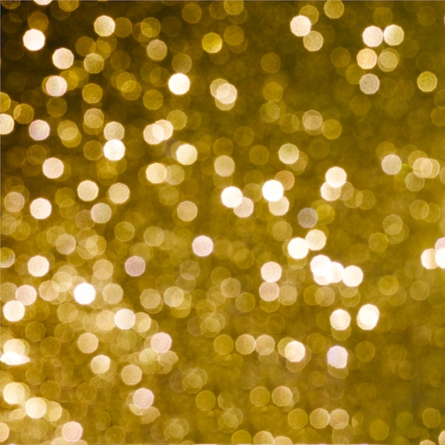 Free photo shiny golden light background