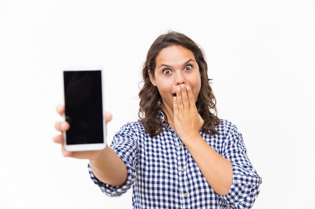 Shocked excited customer showing blank phone screen