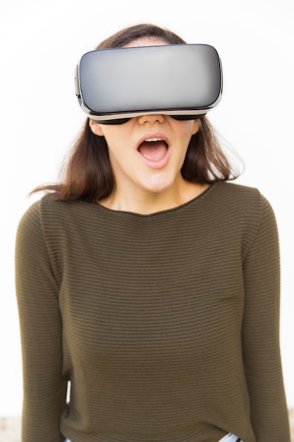 Free Photo shocked excited woman in vr headset shouting