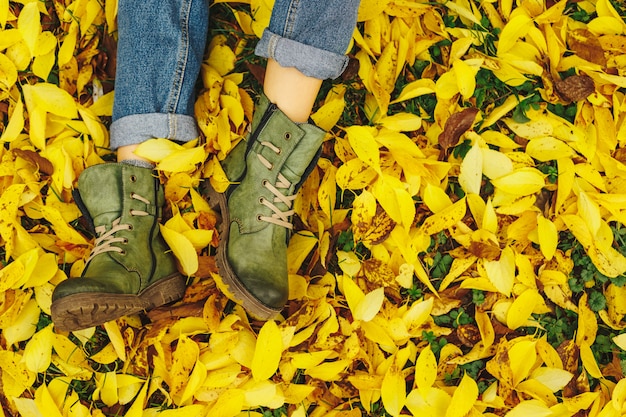 Shoes in yellow autumn leaves