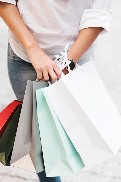 Free photo shopping girl carrying bags