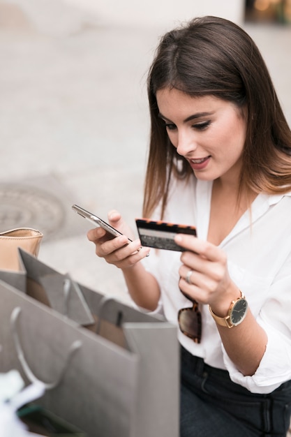 Shopping girl using shopping card