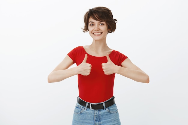 Free Photo short hair girl posing in red tshirt