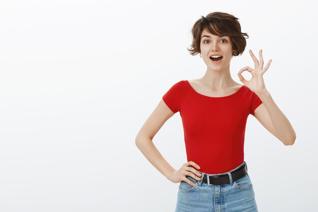 Free Photo short hair girl posing in red tshirt