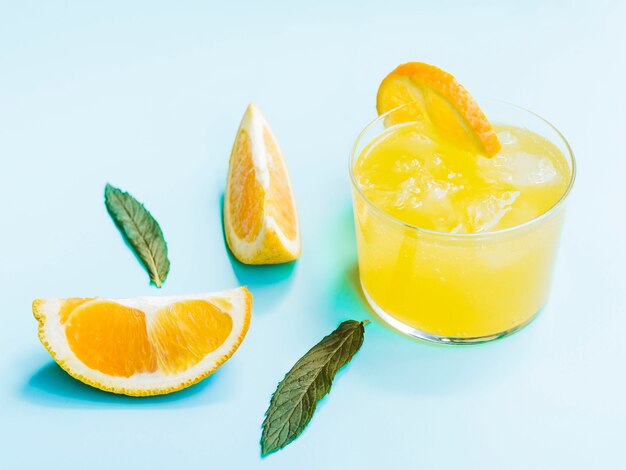 Shot of cold orange drink