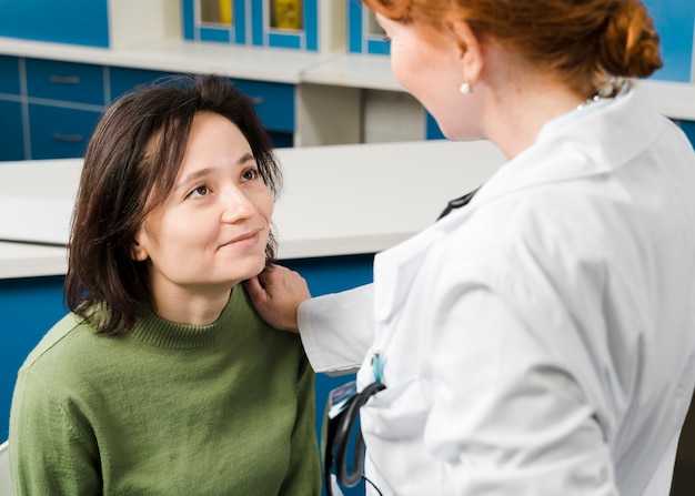 Over the shoulder view doctor and patient