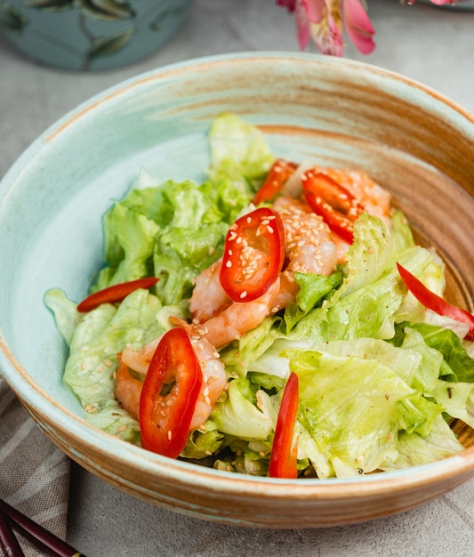 shrimp vegetable salad in a round plate