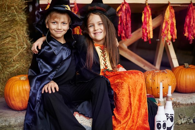 Siblings celebrating great Halloween party
