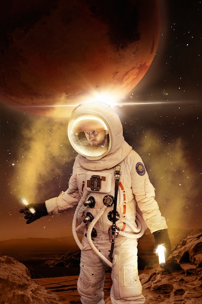 Side view astronaut with spacesuit on mars