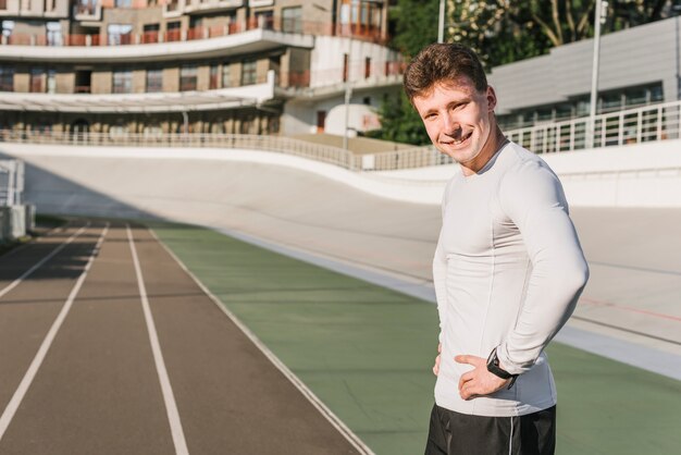 Side view of athlete at running track