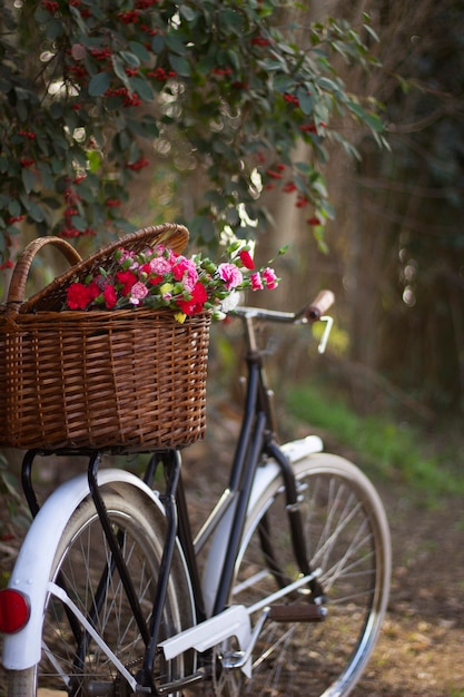 Side view bicycle basket with beautiful flowers