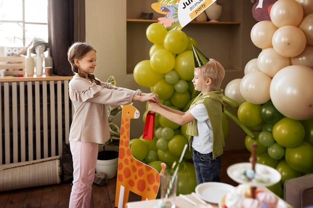 Side view boy receiving gift