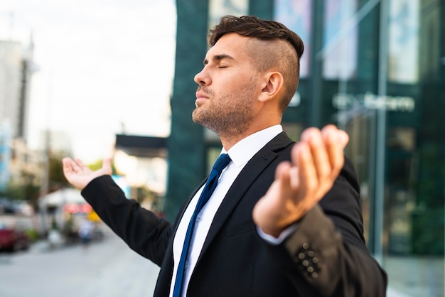 Side view business man feeling the fresh air