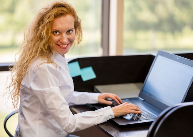 Side view businesswoman working