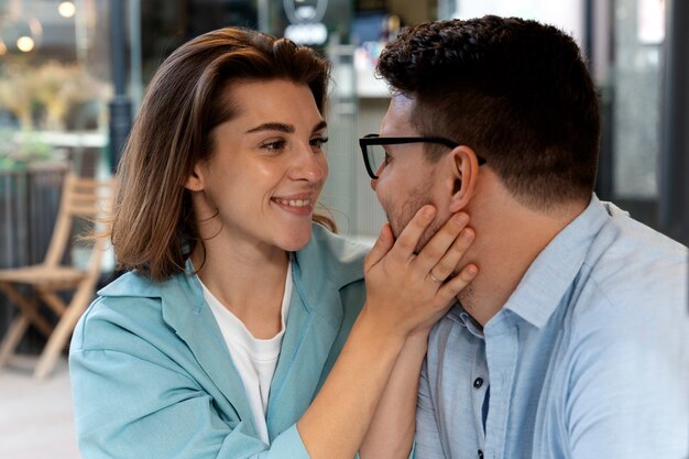 Side view cute smiley couple