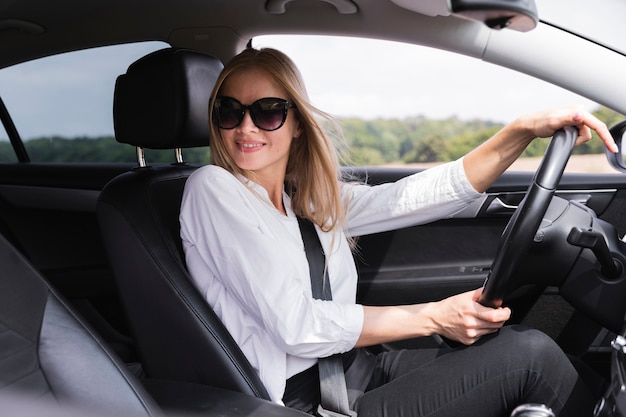 Side view of driver with sunglasses