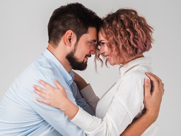 Free Photo side view of embraced couple for valentines