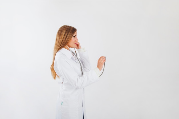 Side view of female doctor with stethoscope