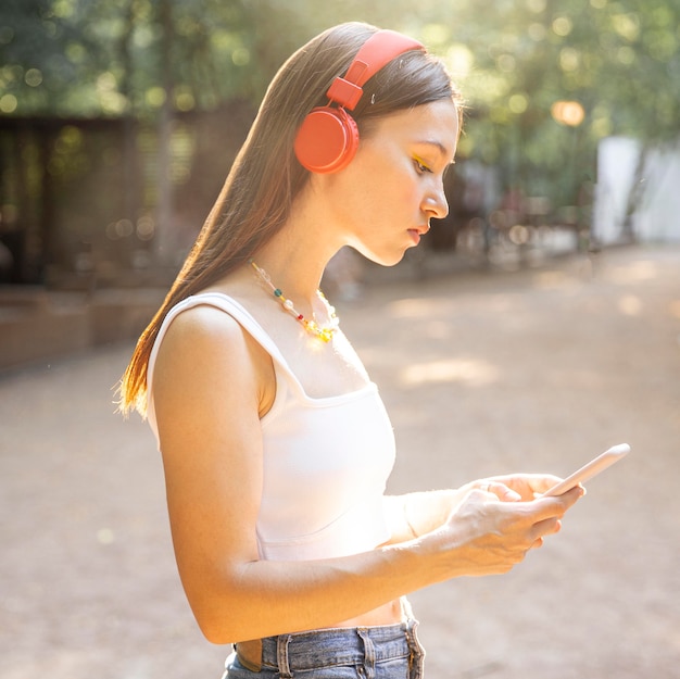 Side view girl with headphones