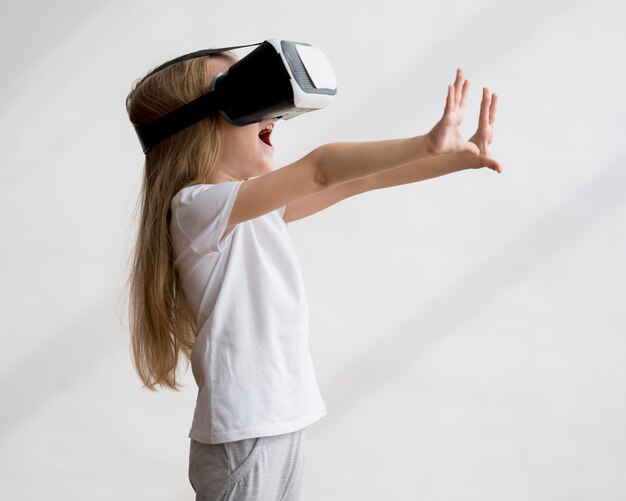 Side view girl with virtual reality headset