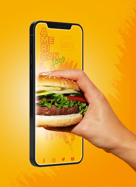 Free Photo side view hand holding burger