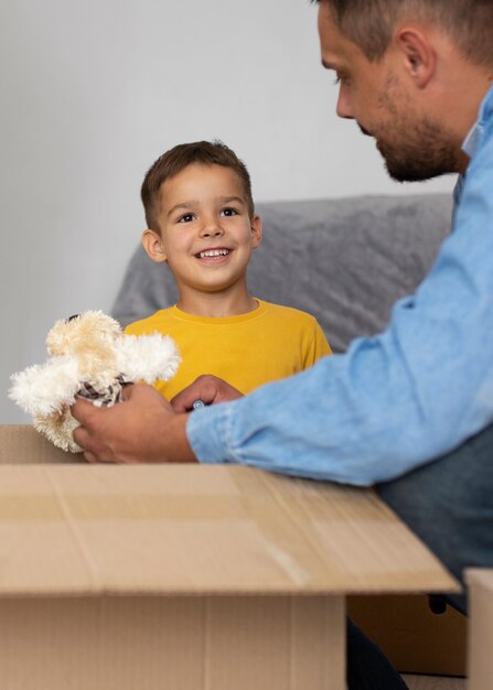 Side view man and smiley kid