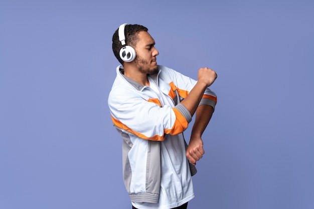 Side view man wearing headphones