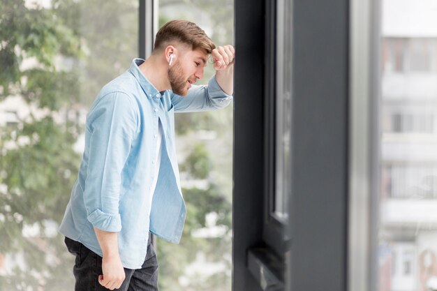 Side view man with airpods