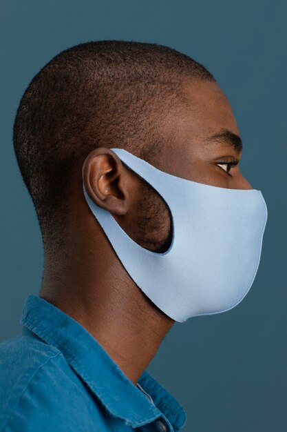 Side view of man with face mask