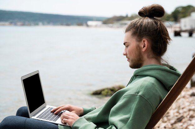 Side view man working outdoors